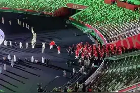 中国队入场！“白糖拌西红柿”礼服，大有玄机图片