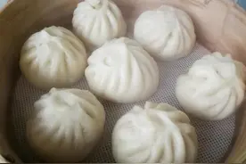 中国包子在美国风靡，老外很喜欢吃，一口气连吃4个都不过瘾图片