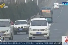 司机将手机放在支架上操作也会被抓拍，违法者将被罚200元扣两分