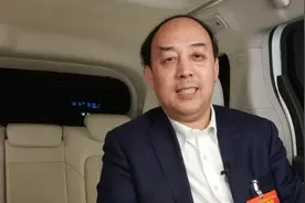 对话两会：专访全国人大代表周洪宇视频封面