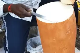 印度独有的街边小吃，远看以为是吐司面包，近看才知是这种水果图片