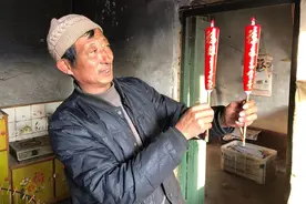 青岛韩家寨村手工蜡烛 一根芦苇杆要蘸75次蜡油图片