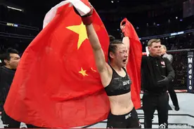 张伟丽击败波兰选手 成功卫冕UFC金腰带图片