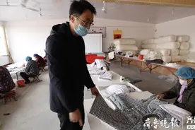 吴照京想做好两件小棉袄，一件暖人身，一件暖人心图片