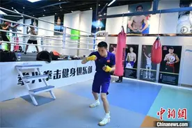 中国拳王徐灿：把更多金腰带带回家乡图片