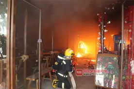 玉林一餐饮店开业当天发生火灾 只因厨师接个电话图片