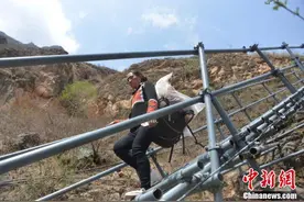 再见“悬崖村”四川凉山村民走下天梯搬新家图片