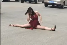 南宁一女子拦停多辆车，趴车上做妖娆动作！警方：她喝多了图片