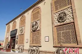 新疆打造“乡村旅游”新体验 农家人靠“农景”致富图片