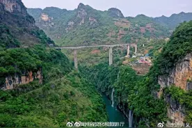 清水河景区：瀑布悬如练 大桥卧似虹图片
