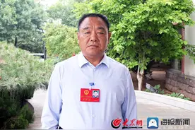 新泰市人大常委会委员王光忠：做“良心教育”办“放心学校”图片