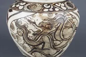 丝路百馆百物 | 白底黑绘龙凤纹罐图片