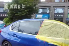 宝马新车“雨棚”太寒酸？车主闻讯赶来却连连道谢图片