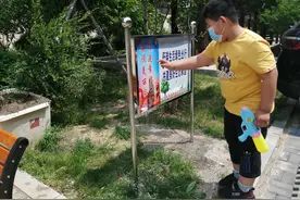 热电社区安装温馨提示牌 传递文明接力棒温暖人心图片
