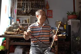 “琴痴”张立图片