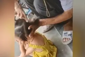 爷爷为孙女第一次尝试绑头发，网友：这可能是最仔细的活儿图片