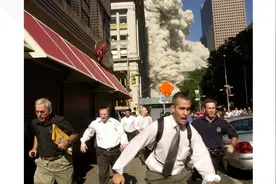 9·11幸存者库珀因新冠肺炎去世，曾因逃离世贸大楼一带时被拍进照片而出名图片