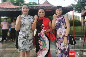 高考首日：三亚家长穿旗袍送考 寓意“旗开得胜”图片