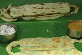 印度一家餐厅推出口罩形煎饼 老板称为提高人们戴口罩意识图片