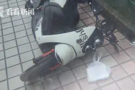 雨天马路上窨井冒油污 一天内7人“中招”图片