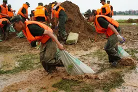 海外网评：“人民至上”筑起防汛救灾坚强堤坝图片