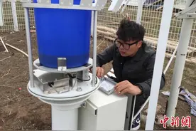 坚守在黄河源头汛情现场的气象人图片