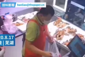 神操作！女子趁店主不备偷烤鸭塞裤裆，结果被监控拍个正着图片