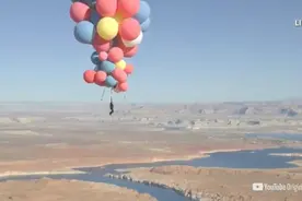 徒手抓气球翱翔在25000英尺高空，他做到了图片