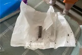 刚晒出去的被子被楼上扔的烟头点着，女主人：考虑做DNA检测图片
