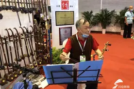 文旅博览会德州展区的手艺人：五天做出一把二胡，传承传统手工技艺我愿意干图片