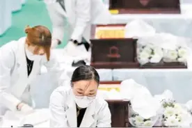 117位志愿军烈士遗骸在韩装殓图片