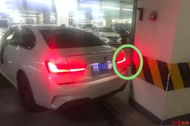 才买一个月不到的宝马车，自动泊车时撞上水管 责任该谁担？图片