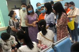 玉林一小学超20名学生发烧腹泻 事发前都吃过蛋糕图片