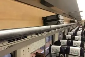 国庆节从上海驶往这座城市的高铁，为何行李架“空空如也”？图片