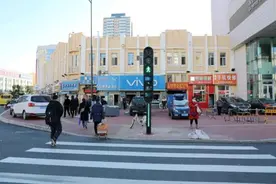 首个行人过街智能监控系统亮相哈尔滨：行人闯红灯被拍，3秒就曝光图片