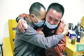流落广州失联20年 男子因一次交通整治兄弟团圆图片