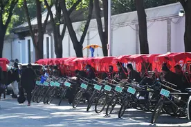 探访︱什刹海胡同游回归首日，车工戴口罩、“一趟一消毒”图片