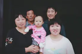 一张全家福，她等了25年……图片