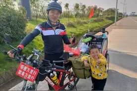 自行车带小拖车，45岁爸爸携3岁儿子骑行万里去海南图片