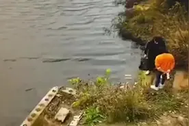 女子系鞋带被同伴推入水库，监控记录全过程图片