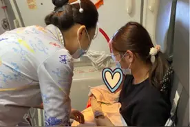 1岁婴儿万米高空卡喉窒息，海航空乘紧急施救……图片