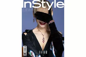 宁静彩虹羽绒裙造型华丽另类 掩面微笑魅力撩人图片