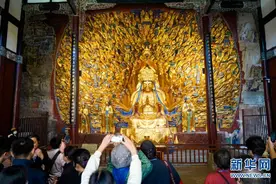 重庆大足石刻景区游客数量稳定回升图片