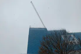 四川省走访慰问川籍在京务工人员 合影时请农民工坐前排……图片