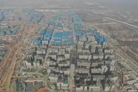 雄安新区容东片区G组团安置房项目率先实现主体结构全面封顶图片