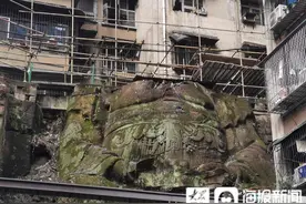 重庆居民楼“无头古佛”成网红景点 官方：找专家去鉴定图片