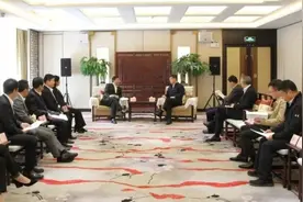 中国化学工程集团有限公司党委书记、董事长戴和根会见广东省副省长覃伟中图片