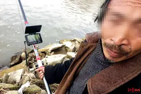 鱼竿上有摄像头！老人用“可视锚鱼竿”捕鱼被抓 警方：超出休闲垂钓图片