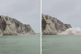 英国白崖一处崖面发生塌方 数以吨计土石掉入英吉利海峡图片