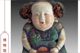 博物馆里的年文物①：小娃娃降服怪兽“年”图片